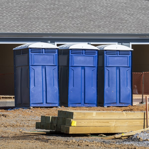 what is the cost difference between standard and deluxe portable toilet rentals in Cameron